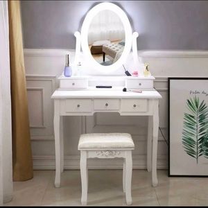 Vanity desk with lighted mirror